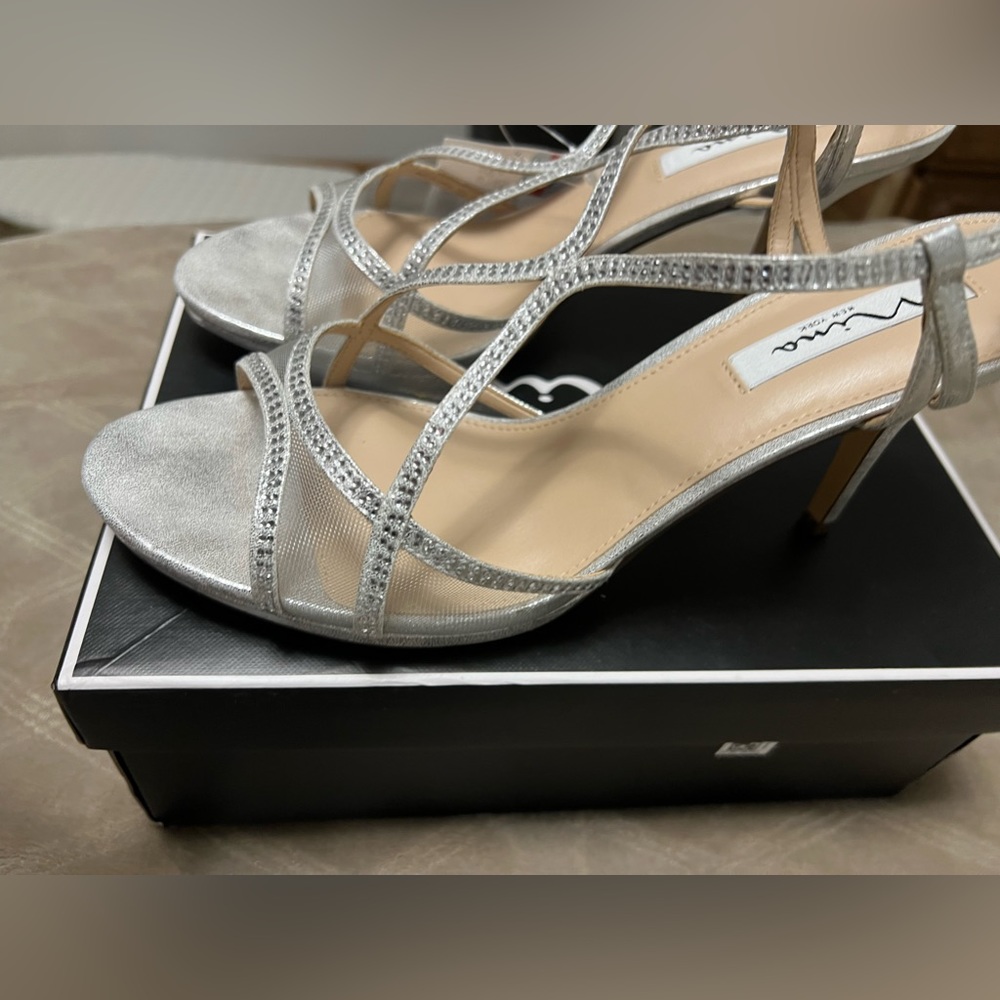Beautiful brand new pair of Rhinestone silver Nina New York heels